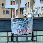 «Шерхан тоже тигр»: Новый плакат активистов появился в Алматы