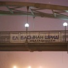 Алматыда белсенділер «Ел басынан шiридi» деген баннер ілді