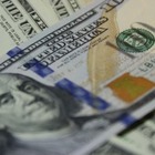 473,7 тенге будет стоить доллар через год
